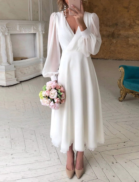 Dames Midi Jurk met V-hals en Pofmouwen